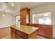 Kitchen island with granite countertop at 7895 W 67Th Ave, Arvada, CO 80004