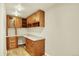 A functional home office area with custom wood cabinetry and stylish granite countertops at 7895 W 67Th Ave, Arvada, CO 80004