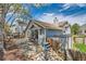 Charming backyard with a spacious deck, privacy fence, and shed at 10440 W 83Rd Ave, Arvada, CO 80005