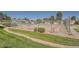 Community tennis court with well-maintained courts and surrounding landscaping at 10440 W 83Rd Ave, Arvada, CO 80005