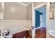 Charming bathroom with a clawfoot tub, hardwood floors, and a pedestal sink at 2541 Bellaire St, Denver, CO 80207