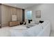Comfortable basement area with a sectional sofa, stylish wood paneling, and recessed lighting at 352 S High St, Denver, CO 80209