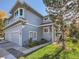 Charming home with a well-maintained lawn, mature landscaping, and a side entry garage at 140 Sugar Plum Way, Castle Rock, CO 80104