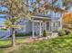 Inviting front porch with a cozy entry and tidy landscaping at 140 Sugar Plum Way, Castle Rock, CO 80104