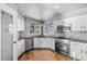 Bright kitchen with stainless steel appliances, modern cabinets and a view to the backyard at 140 Sugar Plum Way, Castle Rock, CO 80104