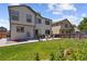 Large backyard with a patio, firepit, and plenty of space for outdoor activities and relaxation at 16581 Buckthorn Ln, Parker, CO 80134