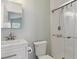 The bathroom features a white vanity and a glass-enclosed shower with a shower head at 16581 Buckthorn Ln, Parker, CO 80134