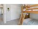 Bedroom with a bunk bed and closet at 16581 Buckthorn Ln, Parker, CO 80134