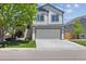 Charming two-story home with a spacious two-car garage and well-maintained lawn at 16581 Buckthorn Ln, Parker, CO 80134