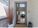 View through open front door into a bright and inviting living space at 16581 Buckthorn Ln, Parker, CO 80134