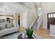 Spacious living room with hardwood floors, fireplace, and staircase at 16581 Buckthorn Ln, Parker, CO 80134