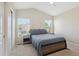 Bright main bedroom with vaulted ceiling and light-filled windows at 16581 Buckthorn Ln, Parker, CO 80134