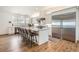 Stylish kitchen featuring a large island, modern appliances, and sleek countertops for a functional and elegant space at 6102 S Aberdeen St, Littleton, CO 80120