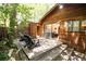 Inviting backyard wooden deck with sliding glass doors leading into the house at 1878 S Gilpin St, Denver, CO 80210