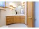 Bathroom with custom vanity, unique fixtures, and lots of natural light at 1878 S Gilpin St, Denver, CO 80210