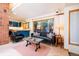 Spacious living room with an open layout, seamlessly connecting the kitchen and sitting area at 1878 S Gilpin St, Denver, CO 80210