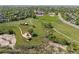Overhead view showing the neighborhood park with a playground, sports field, and recreation area surrounded by homes at 20922 E Crestline Cir, Centennial, CO 80015