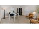 Bright home office with a modern desk, stylish shelving, and comfortable seating, perfect for remote work at 20922 E Crestline Cir, Centennial, CO 80015