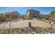 Spacious backyard featuring a stone patio, modern landscaping, and a relaxing hot tub area at 1715 Pioneer Cir, Lafayette, CO 80026