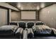 Luxurious home theater with oversized screen and comfortable, reclining seating at 1715 Pioneer Cir, Lafayette, CO 80026