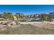 Community playground with climbing boulders, a picnic shelter, fire pit, and sandbox at 1715 Pioneer Cir, Lafayette, CO 80026