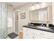 Modern bathroom with a tiled glass shower and vanity at 2000 Little Raven St # 501, Denver, CO 80202