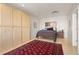 Comfortable bedroom with hardwood floors, a large wardrobe, and a queen-sized bed at 2000 Little Raven St # 501, Denver, CO 80202