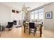 Bright dining room features large windows with city views and a unique chandelier at 2000 Little Raven St # 501, Denver, CO 80202