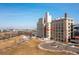 Exterior view of building complex showcasing architectural design and surrounding landscaping on a sunny day at 2000 Little Raven St # 501, Denver, CO 80202