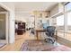 Stylish home office area with a modern desk setup, large windows, and views of the city at 2000 Little Raven St # 501, Denver, CO 80202