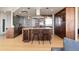 Modern kitchen with stainless steel appliances, custom backsplash, hardwood floors and granite countertops at 2000 Little Raven St # 501, Denver, CO 80202