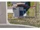 Aerial view of a home with a fenced backyard, new patio and solar panels at 4811 River Highlands Loop, Elizabeth, CO 80107