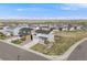 Well-maintained two-story home with an attached garage and landscaped front yard on a corner lot at 4811 River Highlands Loop, Elizabeth, CO 80107