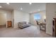 Bright loft featuring a comfortable sitting area, desk space, and ample natural light at 4811 River Highlands Loop, Elizabeth, CO 80107