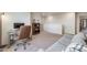 Comfortable loft space with a desk, chair, and cozy couch, ideal for work or leisure at 4811 River Highlands Loop, Elizabeth, CO 80107