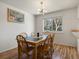 Cozy dining room with natural light, comfortable seating, and a warm atmosphere at 13577 Quivas St, Denver, CO 80234