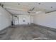 Spacious garage with extra storage and shelving at 2761 S Xanadu Way, Aurora, CO 80014