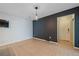 Living room features light and dark gray colored walls with tile flooring at 2761 S Xanadu Way, Aurora, CO 80014