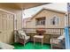 Outdoor patio space with seating for enjoying the community view at 8422 S Upham Way # H75, Littleton, CO 80128