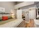 Bedroom with wood floors, good natural light, and a double-door closet at 8422 S Upham Way # H75, Littleton, CO 80128