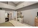 Bedroom with wood floors, good natural light, and a vanity with mirror at 8422 S Upham Way # H75, Littleton, CO 80128