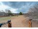Community dog park with fenced area, seating, and views at 8422 S Upham Way # H75, Littleton, CO 80128