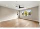 Spacious bedroom with hardwood floors and an abundance of natural light from large windows at 4570 N Raleigh St, Denver, CO 80212