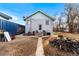 Backyard with detached garage and storage shed at 6145 W 38Th Ave, Wheat Ridge, CO 80033