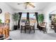 Dining area with table and chairs near kitchen and window at 6145 W 38Th Ave, Wheat Ridge, CO 80033