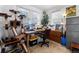 Bright home office features built-in shelving, a computer desk, and large windows at 6145 W 38Th Ave, Wheat Ridge, CO 80033