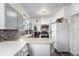 Bright kitchen with stainless steel appliances and a breakfast nook at 6145 W 38Th Ave, Wheat Ridge, CO 80033