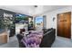 Living room with fireplace, large window, and comfy seating at 6145 W 38Th Ave, Wheat Ridge, CO 80033