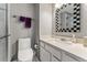 Clean bathroom with white vanity, toilet and shower at 7114 E Briarwood Dr, Centennial, CO 80112