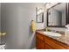 Clean bathroom with granite vanity and updated fixtures at 7114 E Briarwood Dr, Centennial, CO 80112